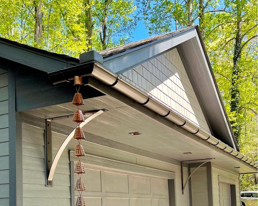 Istalled Gutters On Garage