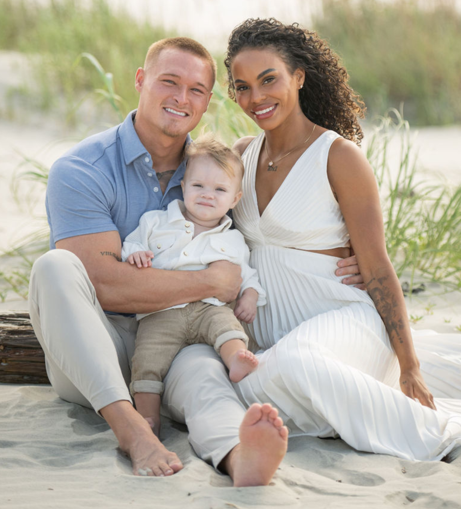 Brent and ashley bauer and baby family photo on beach at Sullivan's island